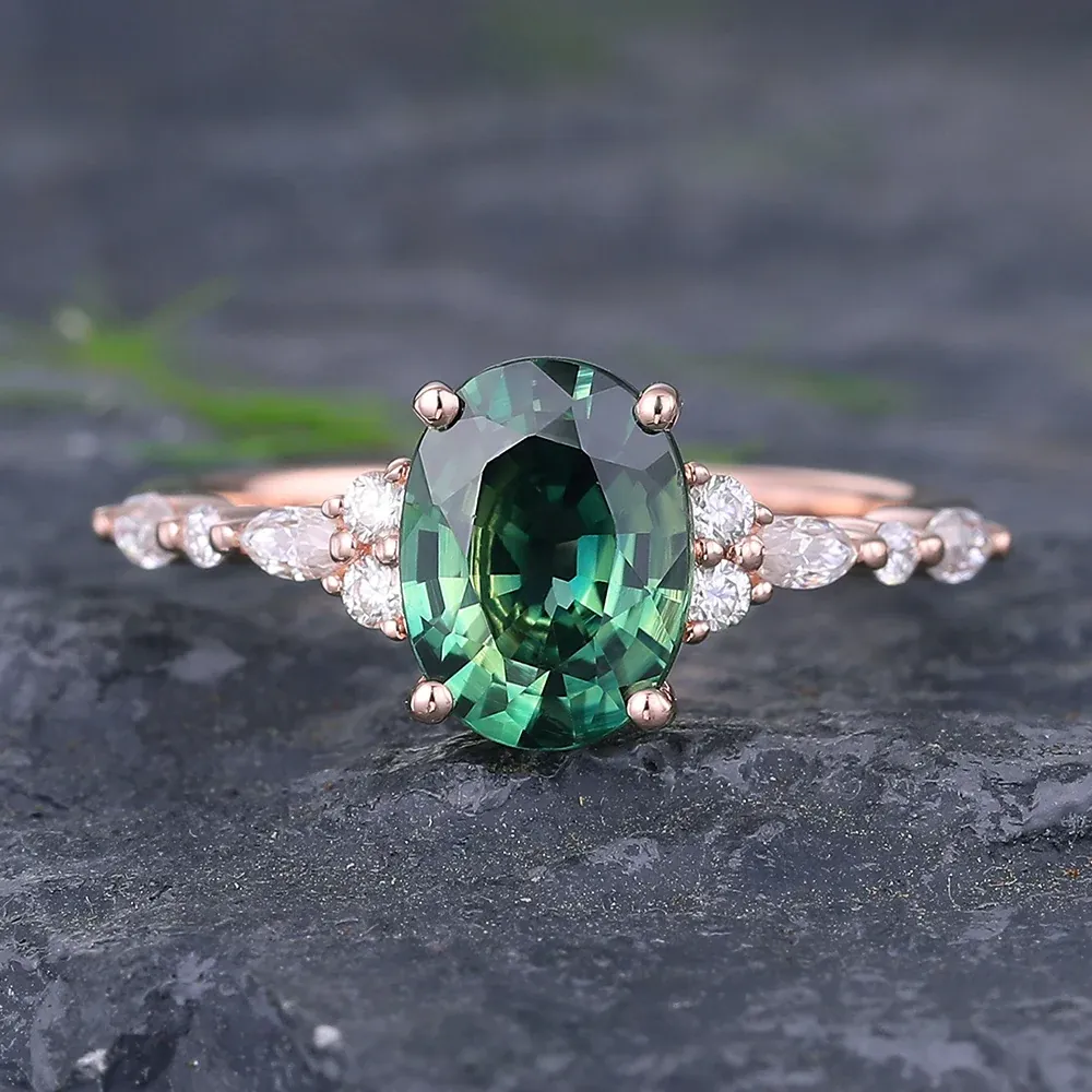 Teal sapphire rose gold ring