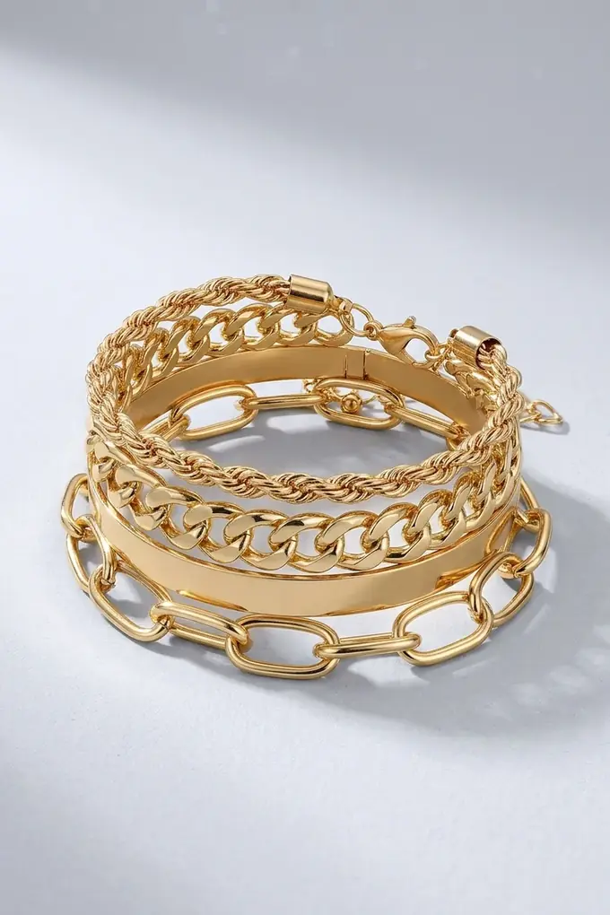 Gold bracelet stack AI-generated on a clean dimensional studio backdrop with soft shadow, no light box used